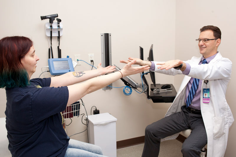 physician and woman physical therapy